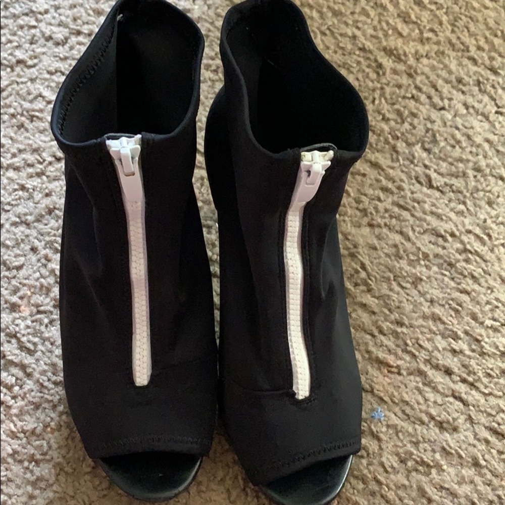 Black and white zip up heels